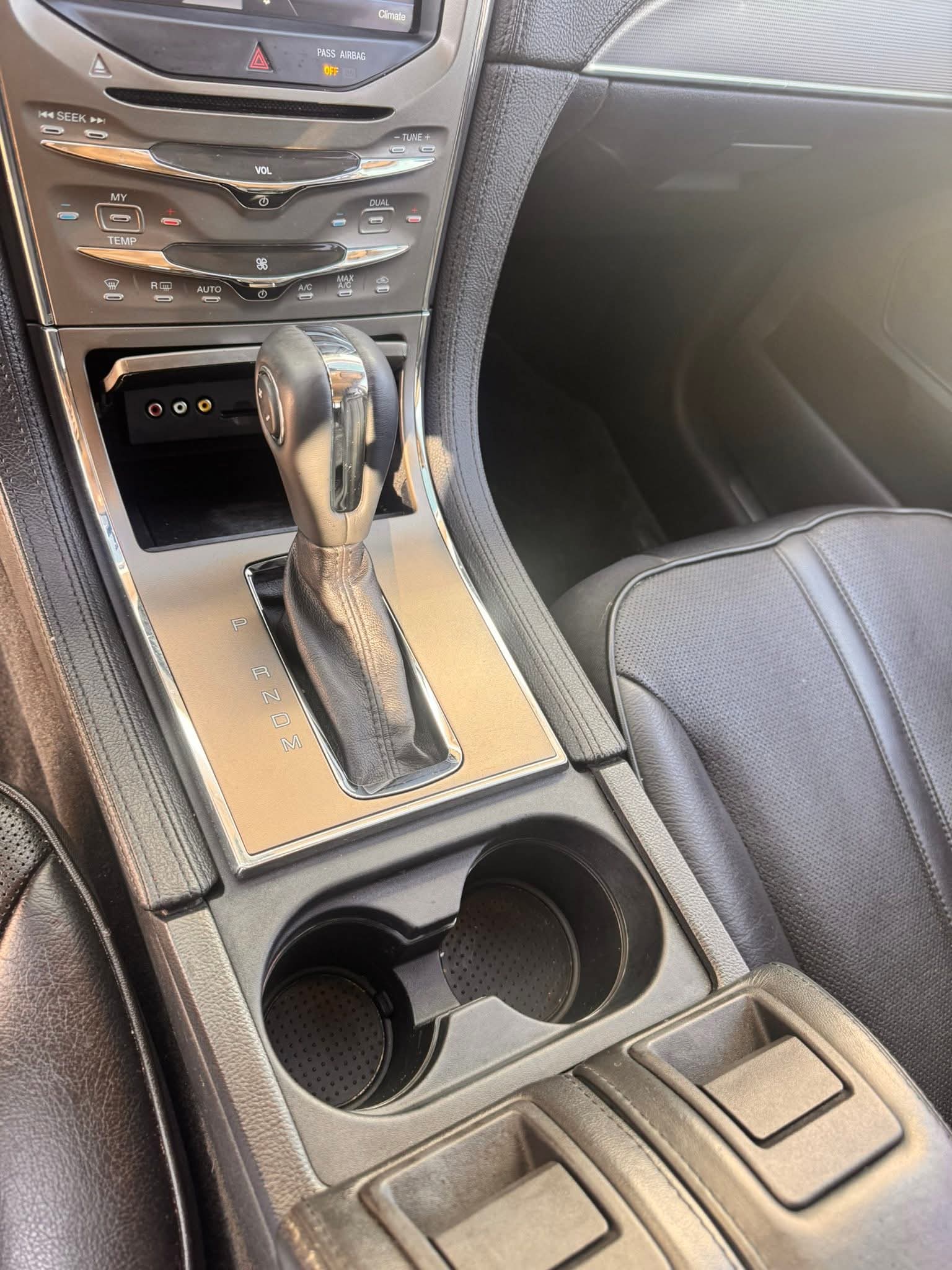 After interior detail showing clean center console and seats