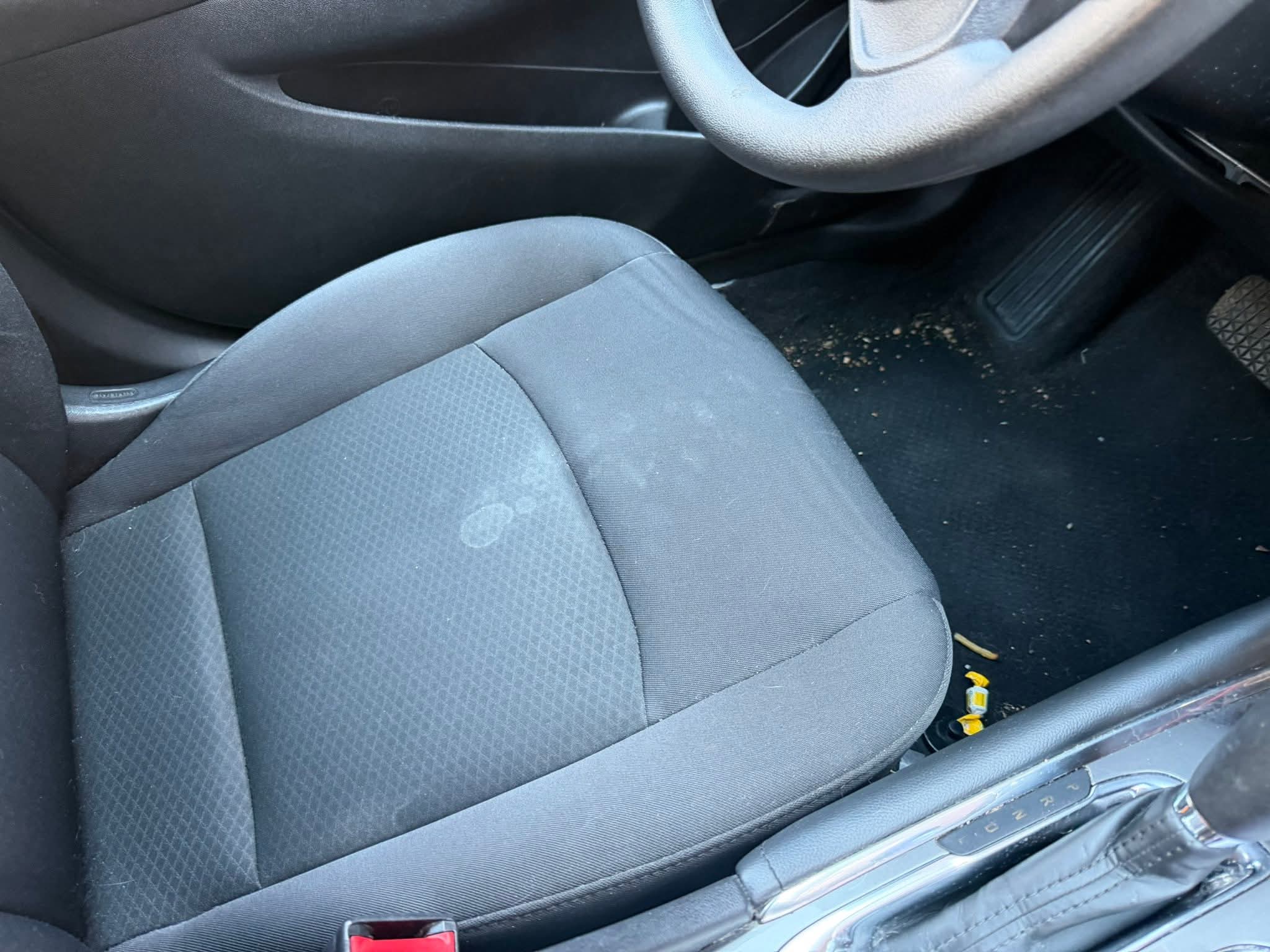 Before interior detail showing dirty front seat and floor